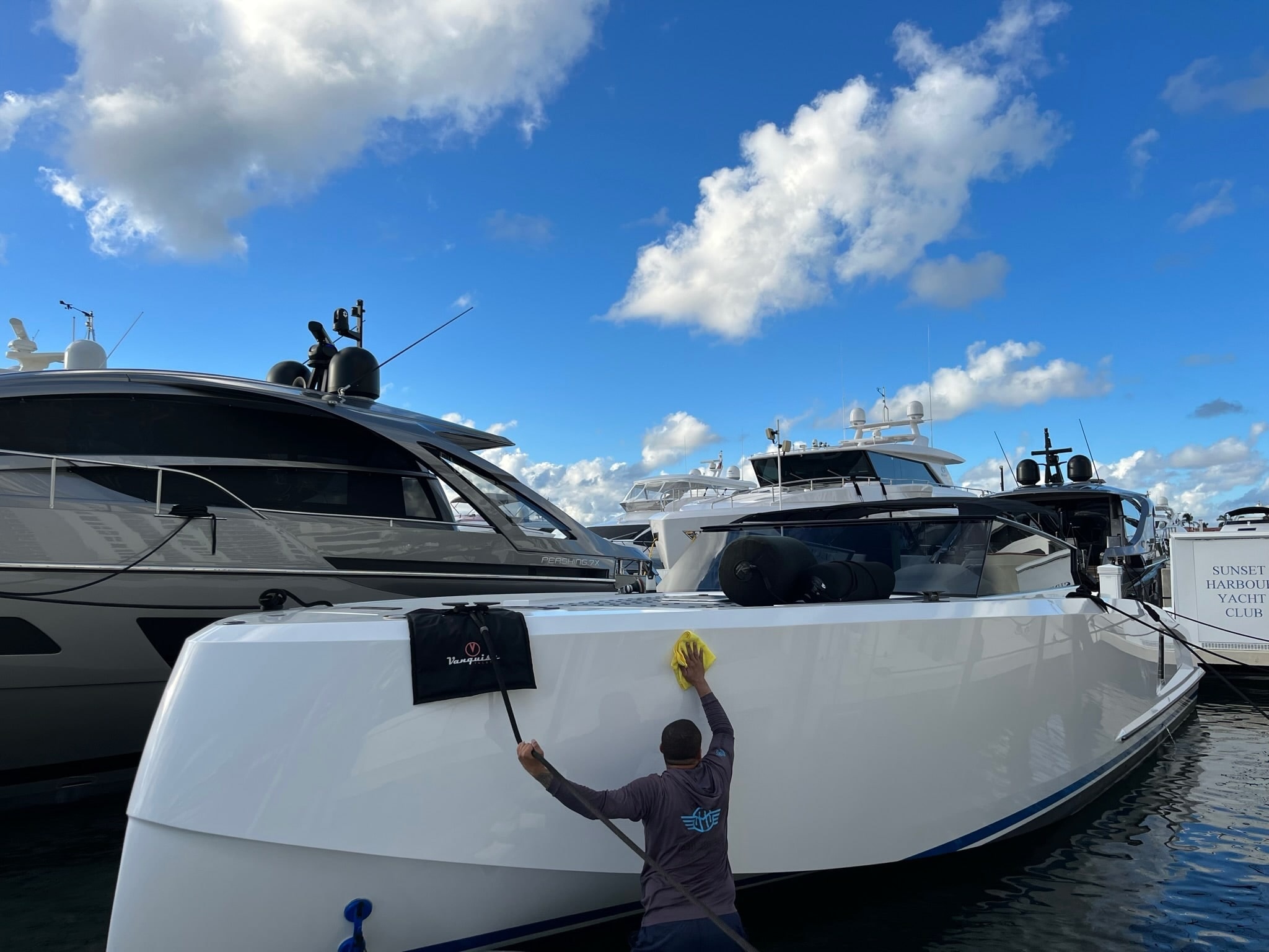 Clean ceramic-coated boat hull at a South Florida marina